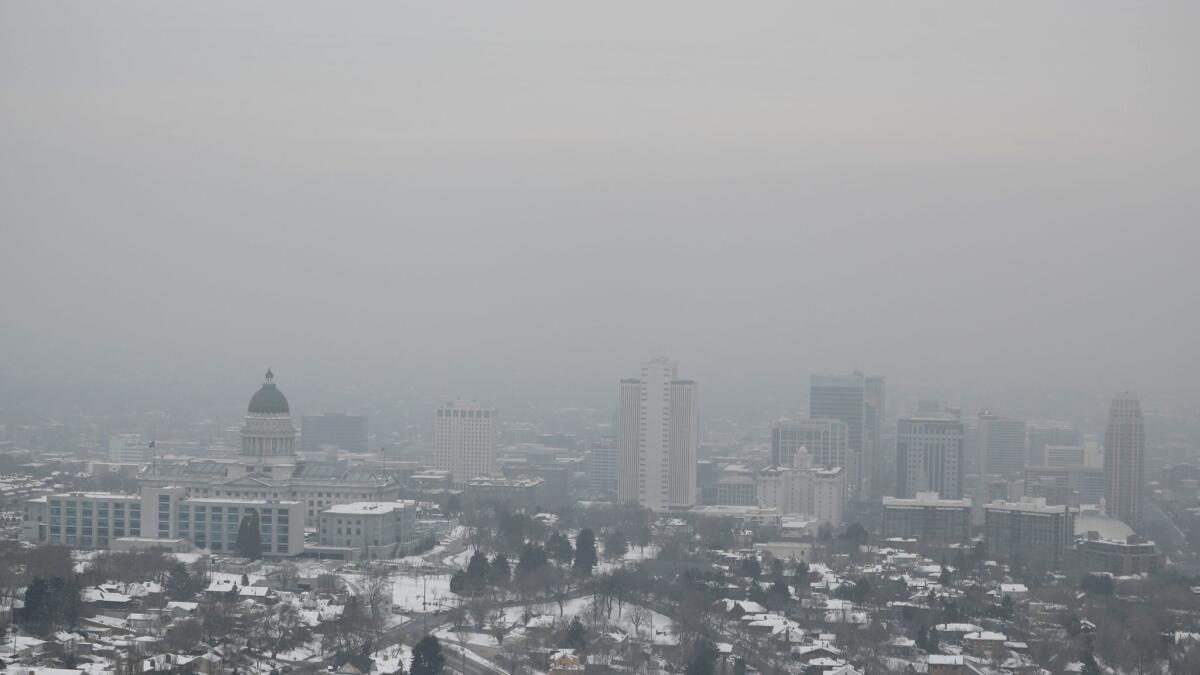 A temperature inversion traps and fills downtown Salt Lake City with thick smog Jan. 31.