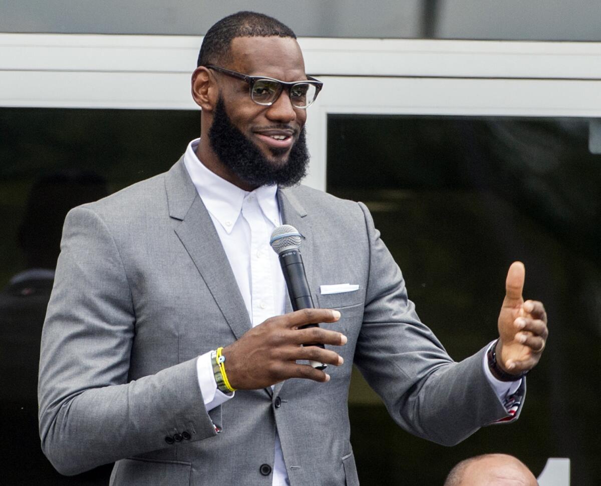 LeBron James speaks at the opening ceremony for the I Promise School in Akron, Ohio.