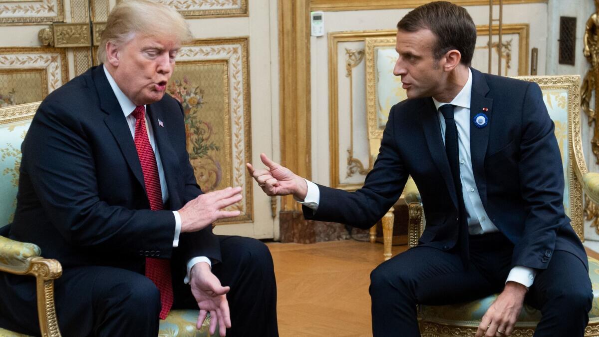 President Trump with French President Emmanuel Macron in Paris on Nov. 10.