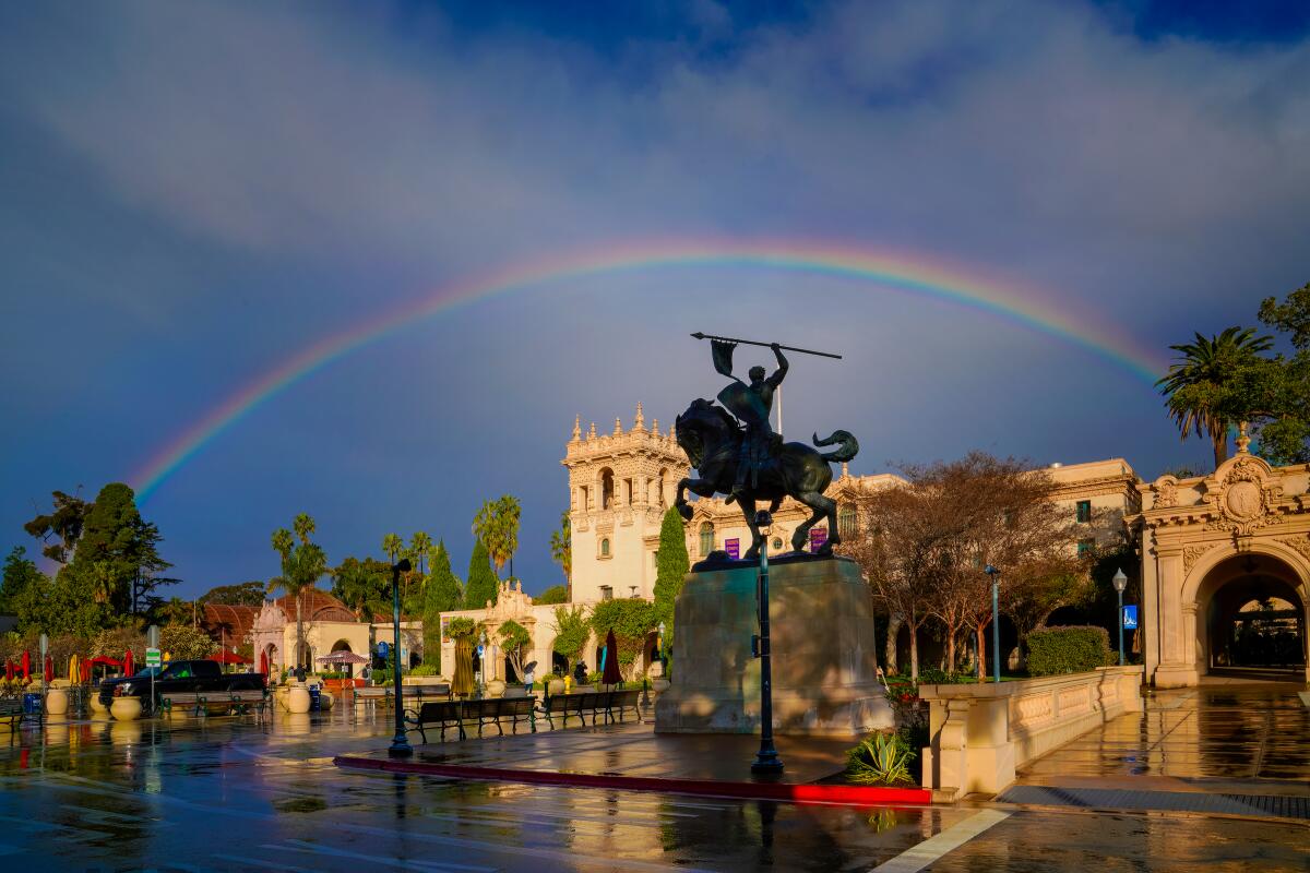 A rainbow forms over Balboa Park in this file photo.