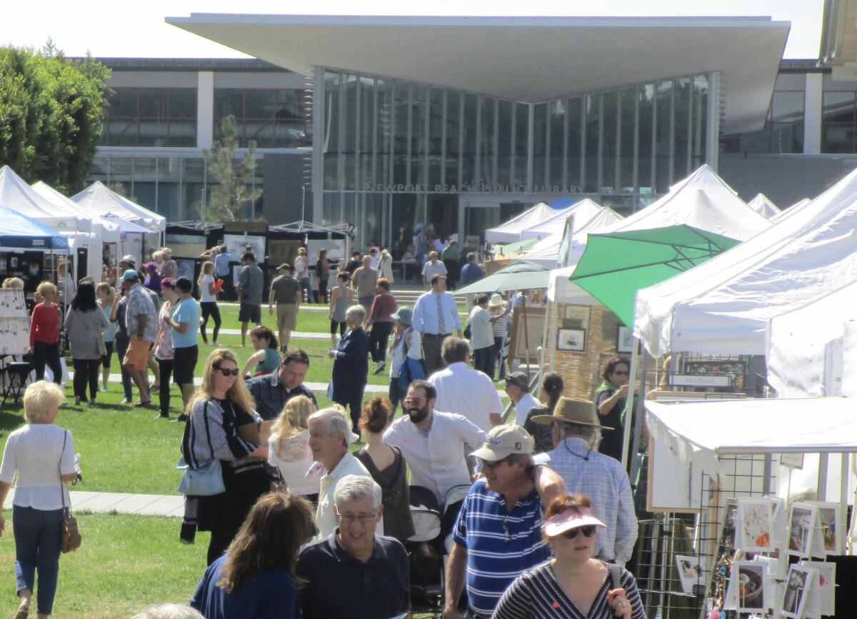 A crowd attends the Newport Beach Art in the Park in 2022.