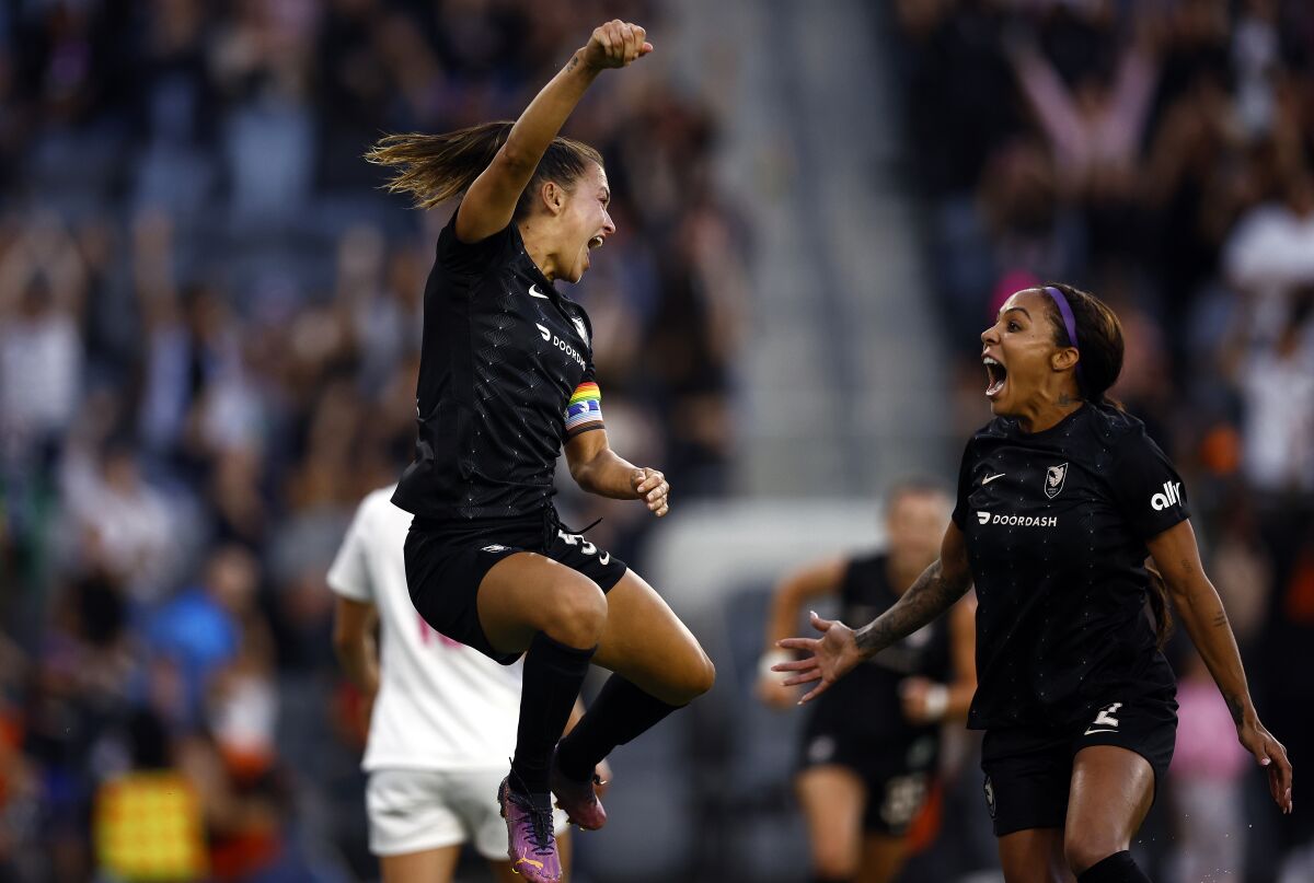 Angel City's Ali Riley, left, and Sydney Leroux are fired up after Riley scored against San Diego.