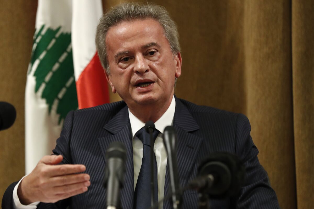 FILE - Riad Salameh, the governor of Lebanon's Central Bank, speaks during a press conference, in Beirut, Lebanon, Nov. 11, 2019. On Tuesday, Jan. 18, 2022, Judge Ghada Aoun, an investigating judge in Beirut, froze some assets belonging to Salameh, who is accused of corruption and dereliction of duties during Lebanon's unprecedented economic meltdown. (AP Photo/Hussein Malla, File)