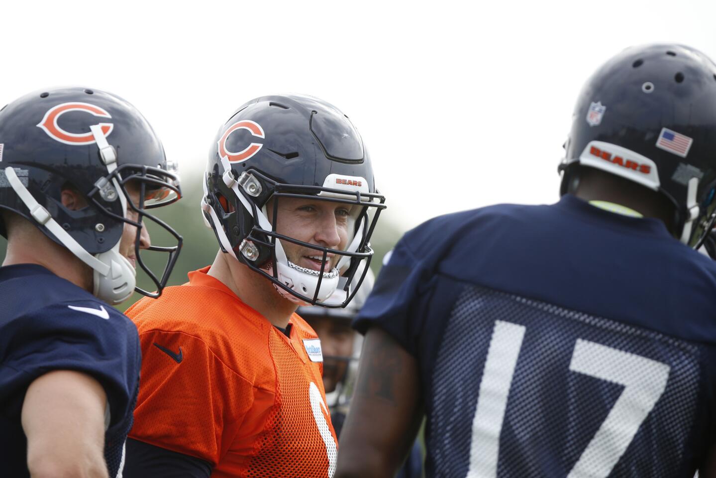 Jay Cutler smiles as he chats with Alshon Jeffery during drills on the first day of Bears training camp in Bourbonnais on Thursday, July 28, 2016.