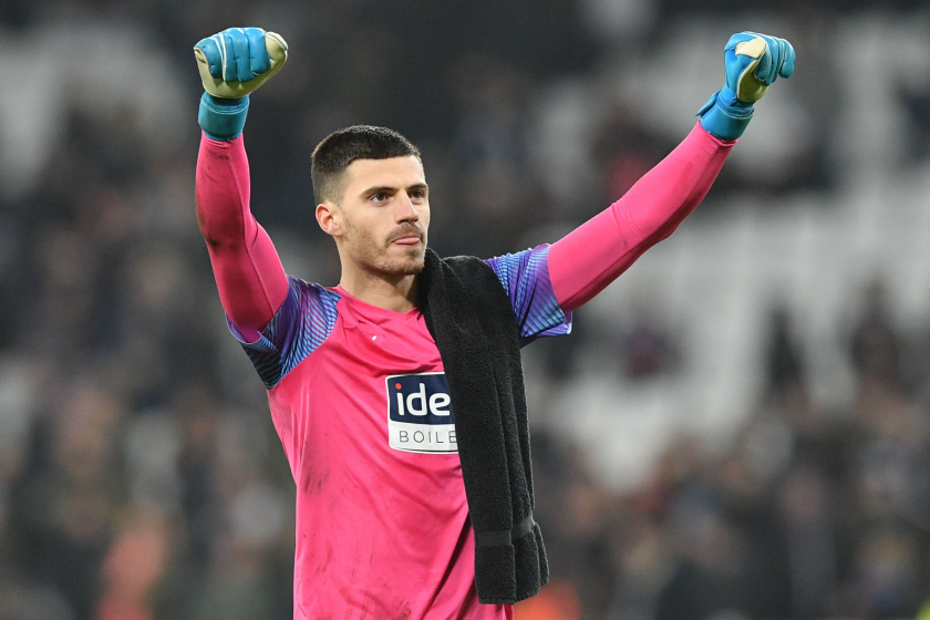 West Bromwich Albion's English goalkeeper Jonathan Bond celebrates on the pitch after the English FA Cup fourth round.