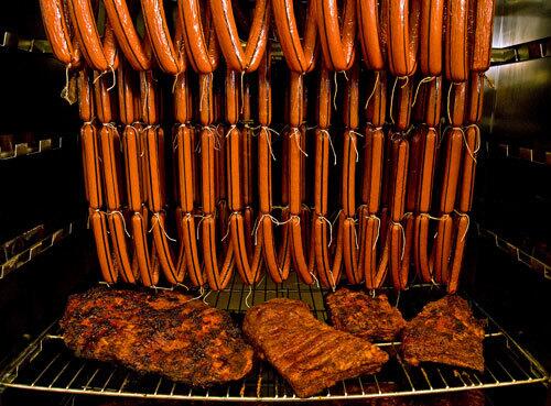 Hot dogs and old-fashioned pastrami fill the smoker oven at Jeff's Gourmet Sausage Factory in Los Angeles.
