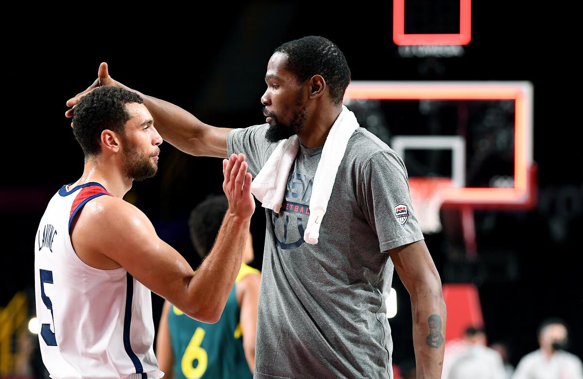 Kevin Durant celebrates with Zach LaVine.