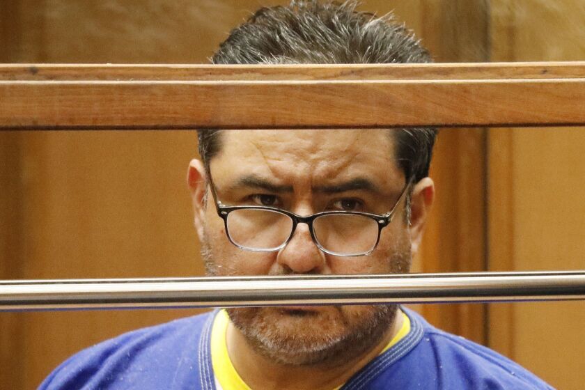Arraignment was postponed for Naason Joaquin Garcia, the leader of a Mexico-based evangelical church La Luz del Mundo church that claims to have a worldwide membership of more than one million people. The head of La Luz del Mundo, which has about 40 locations in Southern California and was founded by the defendant's grandfather, appeared in court with his attorney Allen Sawyer as he is charged with crimes, including forcible rape of a minor, conspiracy, extortion and child porn. He is charged along with three female co-defendants, Alondra Ocampo, Susana Medina Oaxaca and Azalea Rangel Melendez. (Al Seib/Los Angeles Times via AP, Pool)