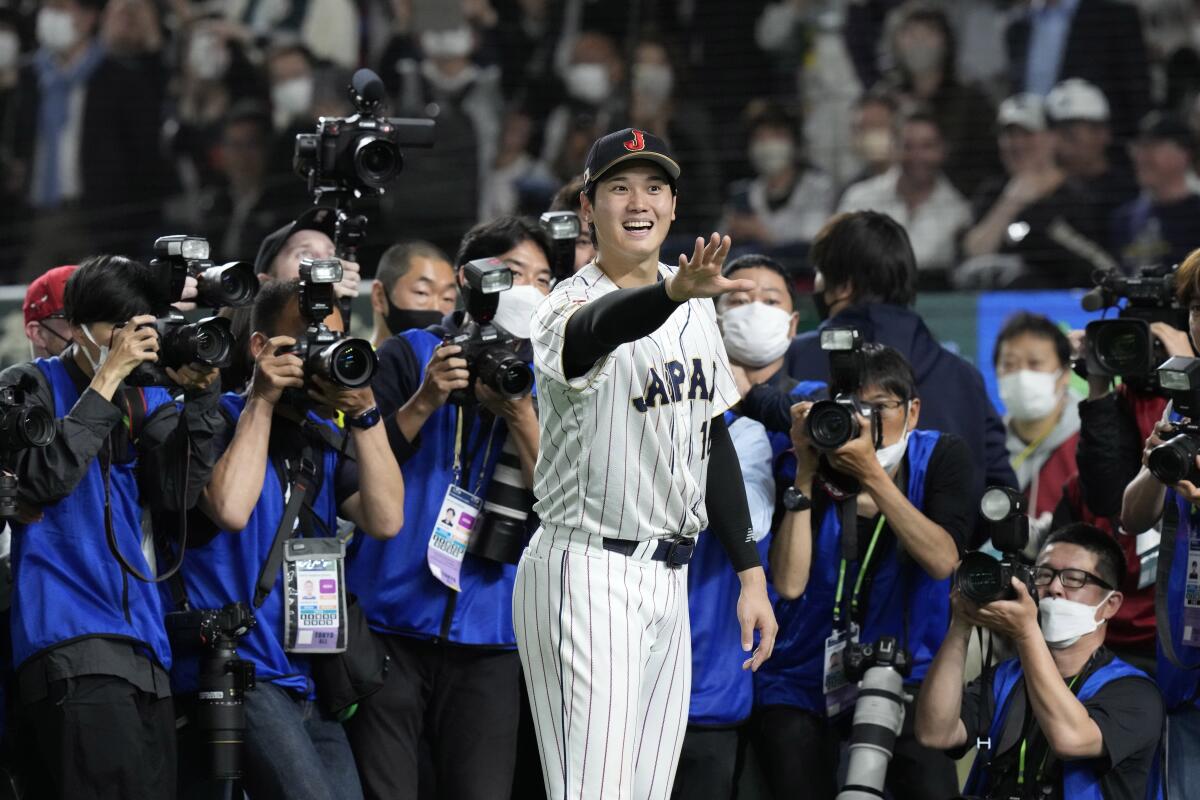 Shohei Ohtani of Japan gestures after finishing t