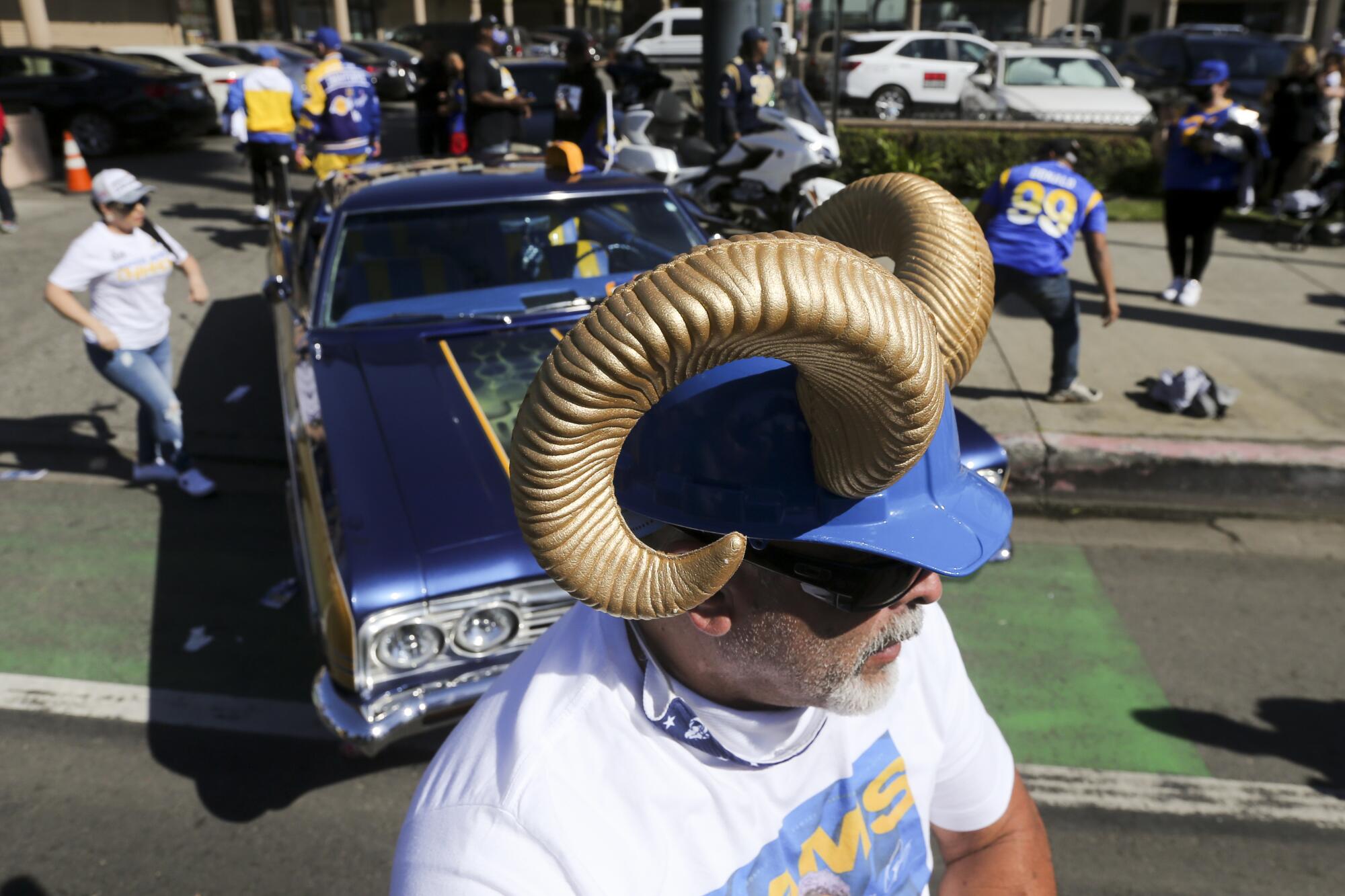 Rams fans gather for the Super Bowl victory parade in Los Angeles.