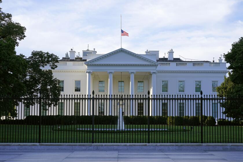 An American flag flies at half-staff over the White House in Washington, Saturday, Sept. 19, 2020. Federal officials have intercepted an envelope addressed to the White House that contained the poison ricin. That's according to a law enforcement official who spoke to The Associated Press on Saturday. (AP Photo/Patrick Semansky)