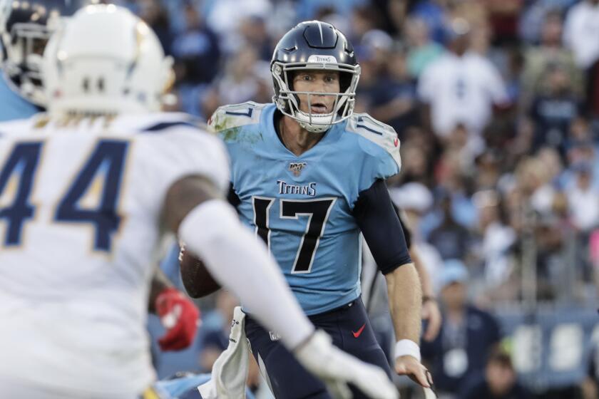 NASHVILLE, TN, SUNDAY, OCTOBER 20, 2019 - Tennessee Titans quarterback Ryan Tannehill (17) scrambles for a first down during a fourth quarter touchdown drive at Nissan Stadium. (Robert Gauthier/Los Angeles Times)