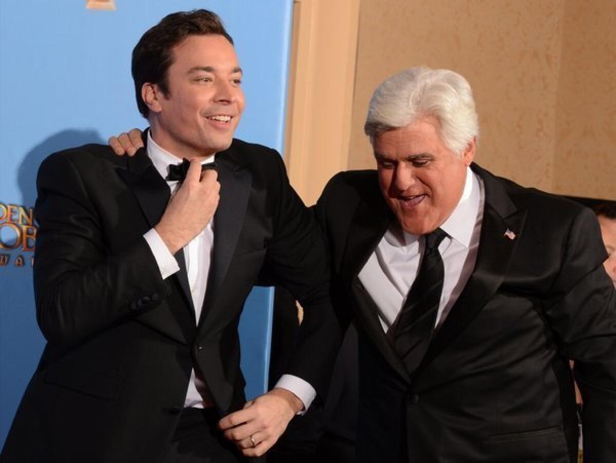 NBC announced that Jimmy Fallon would take over "The Tonight Show" in early 2014. Comedians Jimmy Fallon, left, and "Tonight Show" host Jay Leno are pictured at the Golden Globes awards show in January.