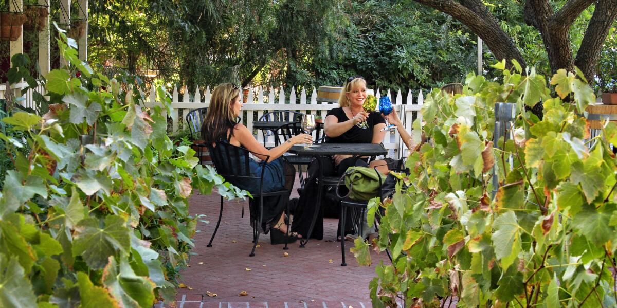 Women wine tasting at Stolpman Winery, one of many tasting places in downtown Los Olivos.