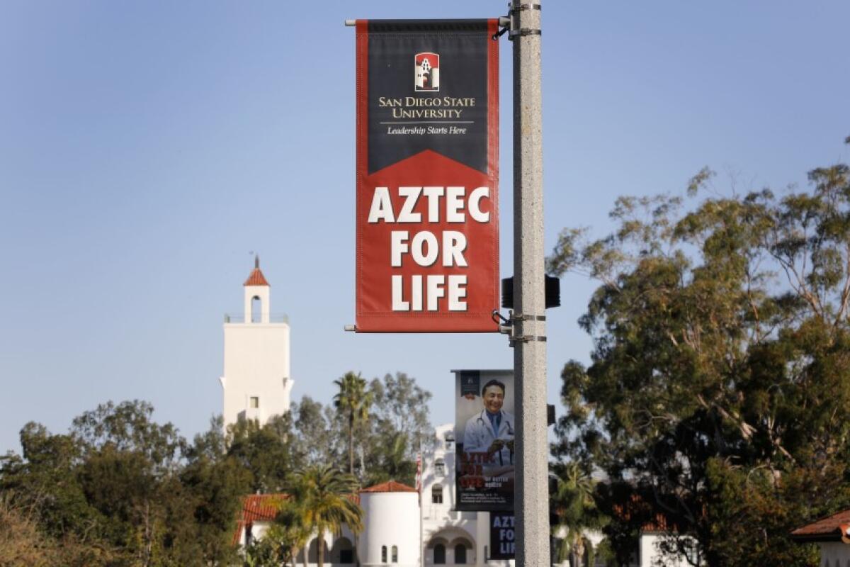 A flag is affixed to a pole at San Diego State.