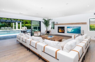 Remodeled in 2020, the four-bedroom farmhouse features a design palette of French oak floors and Italian tile across 3,652 square feet.