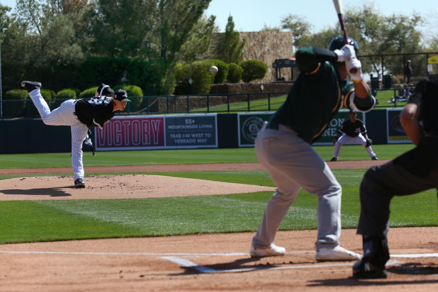 White Sox starter Michael Kopech pitches during a spring game against the A's at Camelback Ranch on Feb. 26, 2018.
