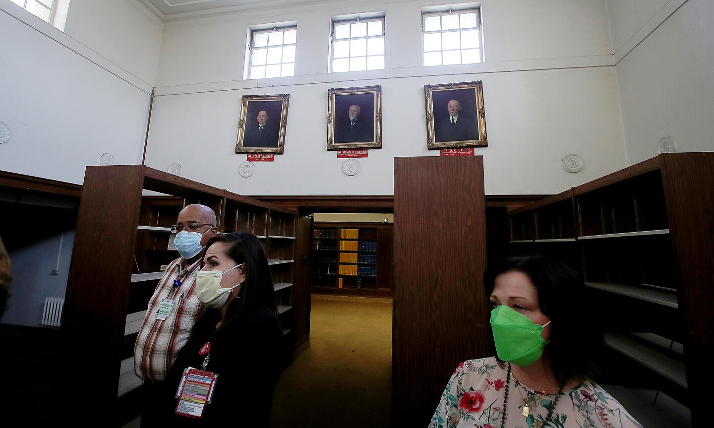 Visitors stand inside the medical library of the Los Angeles County General Hospital.