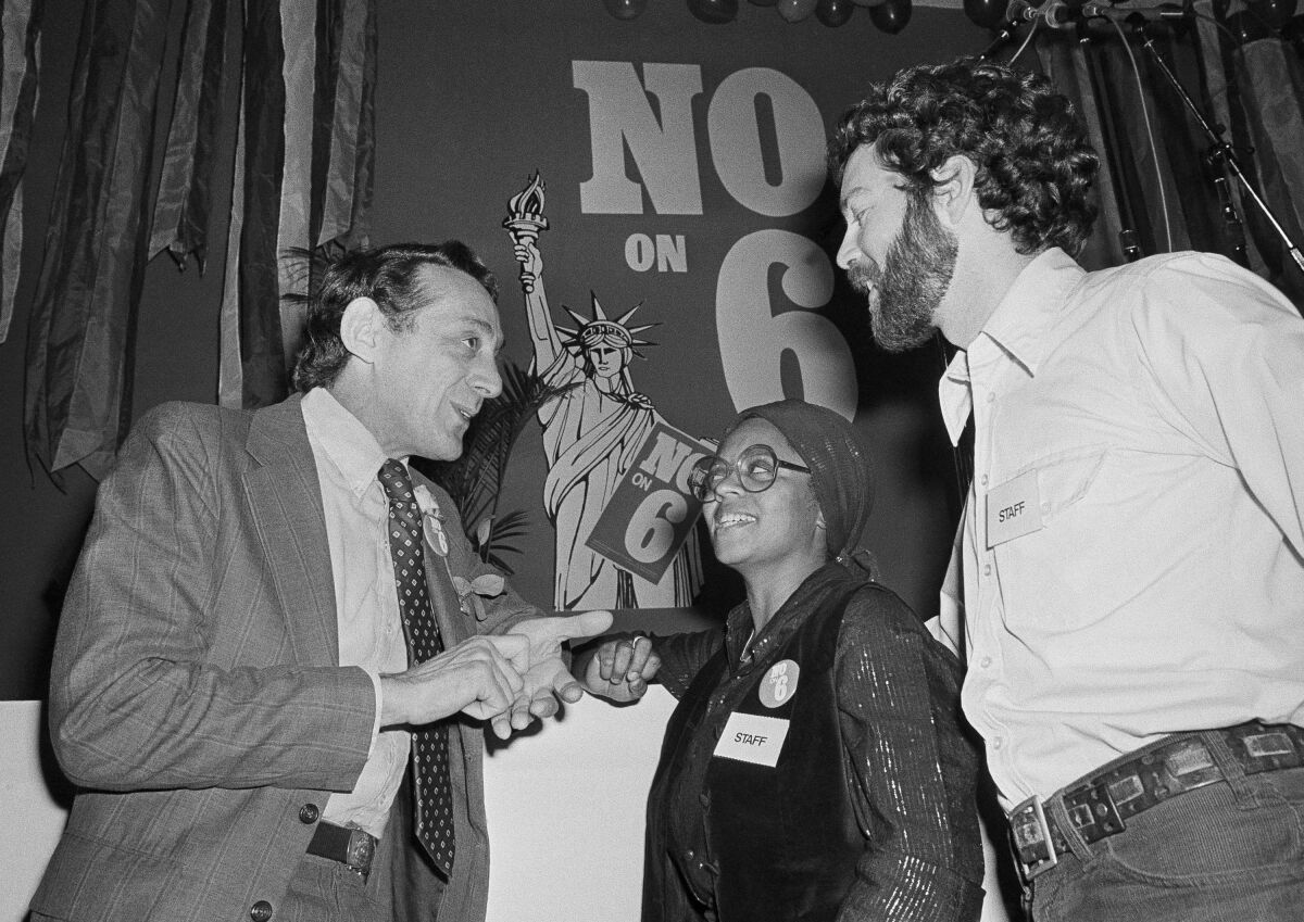 Former San Francisco Supervisor Harvey Milk and political activists Gwenn Craig and Bill Kraus