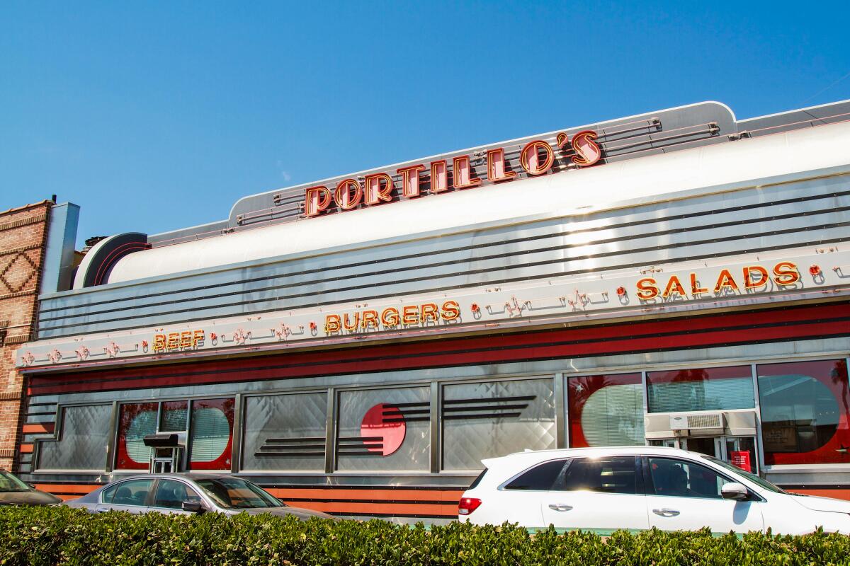 An exterior of Portillo's drive through in Buena Park.