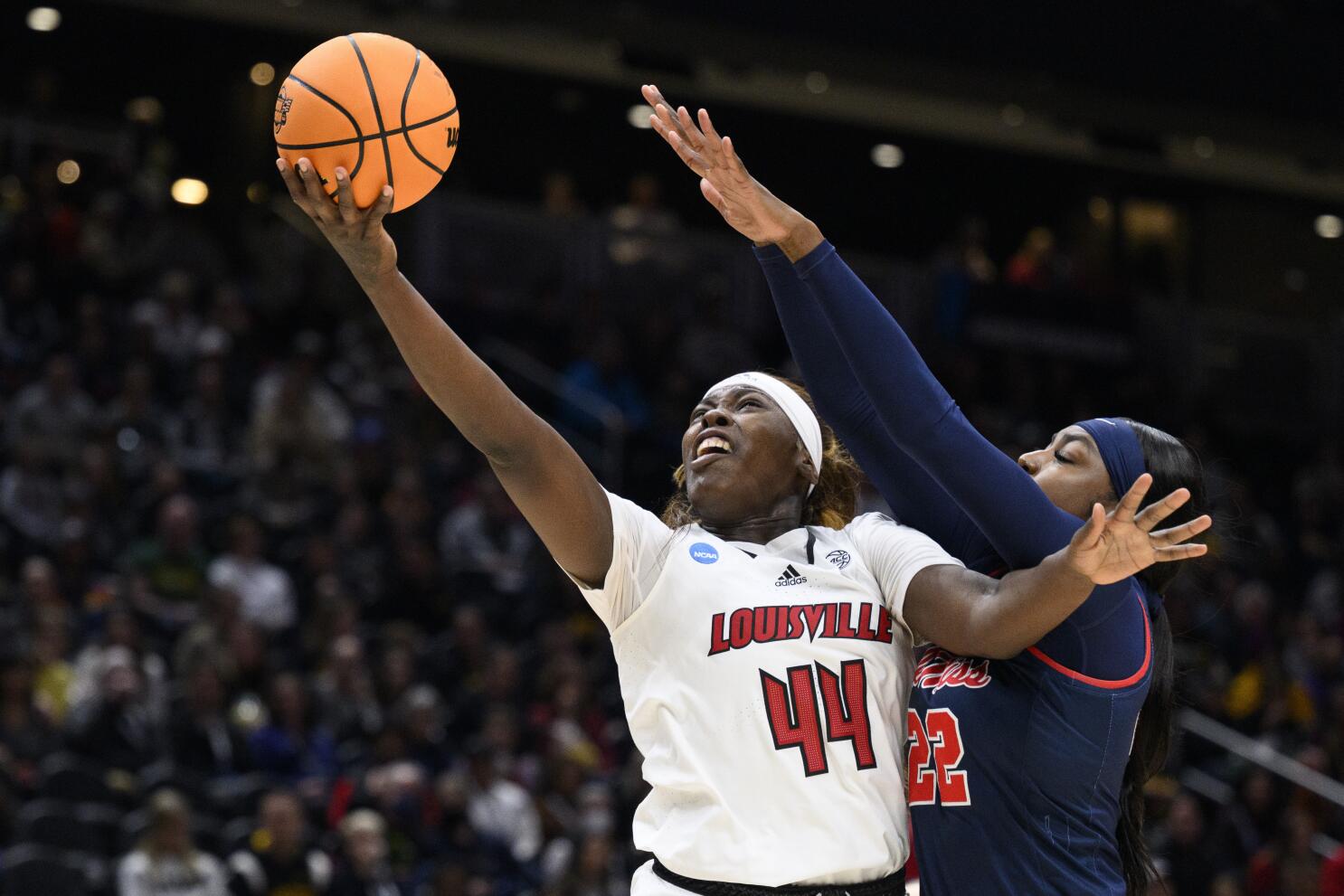 Louisville women's coach Jeff Walz can now 'slide' right into practice