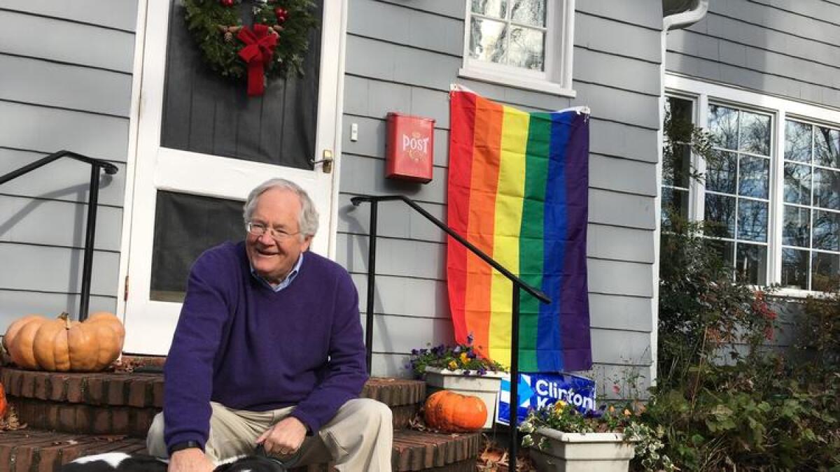 Peter Fenn, a Democratic strategist, is one of several temporary neighbors to Vice President-elect Mike Pence who welcomed him to the neighborhood with newly purchased rainbow flags.