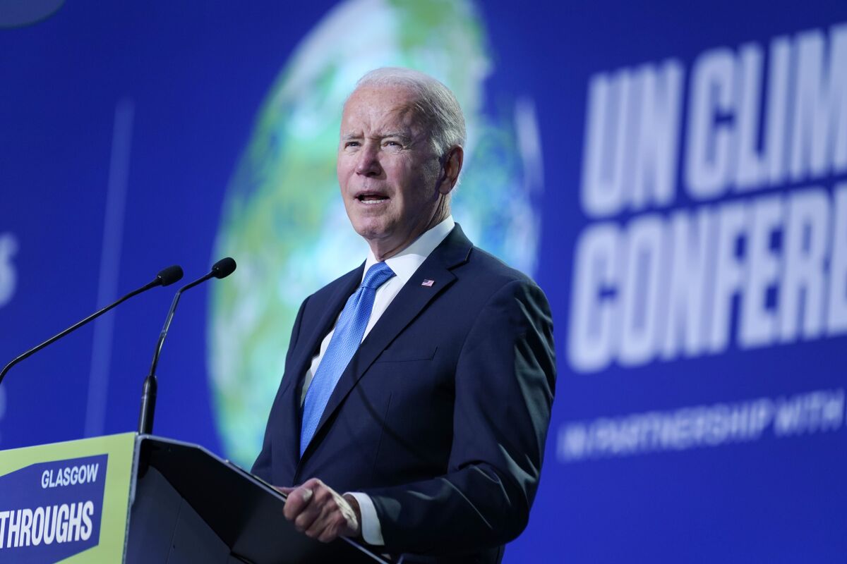 FILE - President Joe Biden speaks during the "Accelerating Clean Technology Innovation and Deployment" event at the COP26 U.N. Climate Summit, Nov. 2, 2021, in Glasgow, Scotland. A federal judge in Louisiana on Friday, Feb. 11, 2022, blocked the Biden administration's move to increase the government's cost estimate of future damages caused by greenhouse gas emissions, a key component of federal rules for oil and gas drilling, automobiles and other industries. (AP Photo/Evan Vucci, Pool, File)