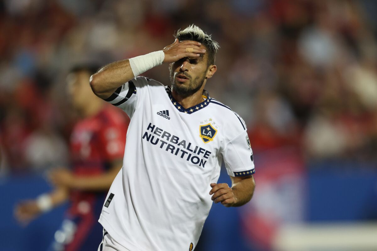 Galaxy midfielder Gaston Brugman reacts after a missed scoring chance in a 3-1 loss to FC Dallas.