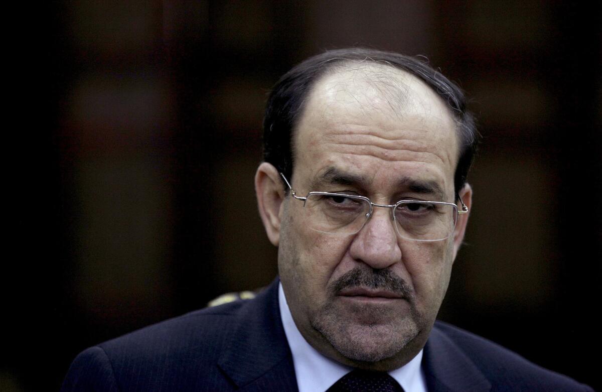 Iraq's Prime Minister Nouri Maliki listens to a question during an interview with The Associated Press in Baghdad, Iraq.