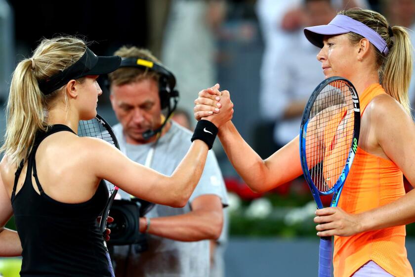 MADRID, SPAIN - MAY 08: Maria Sharapova of Russia congratulates Eugenie Bouchard of Canada at the end of the match on day three of the Mutua Madrid Open tennis at La Caja Magica on May 8, 2017 in Madrid, Spain. (Photo by Clive Rose/Getty Images) ** OUTS - ELSENT, FPG, CM - OUTS * NM, PH, VA if sourced by CT, LA or MoD **