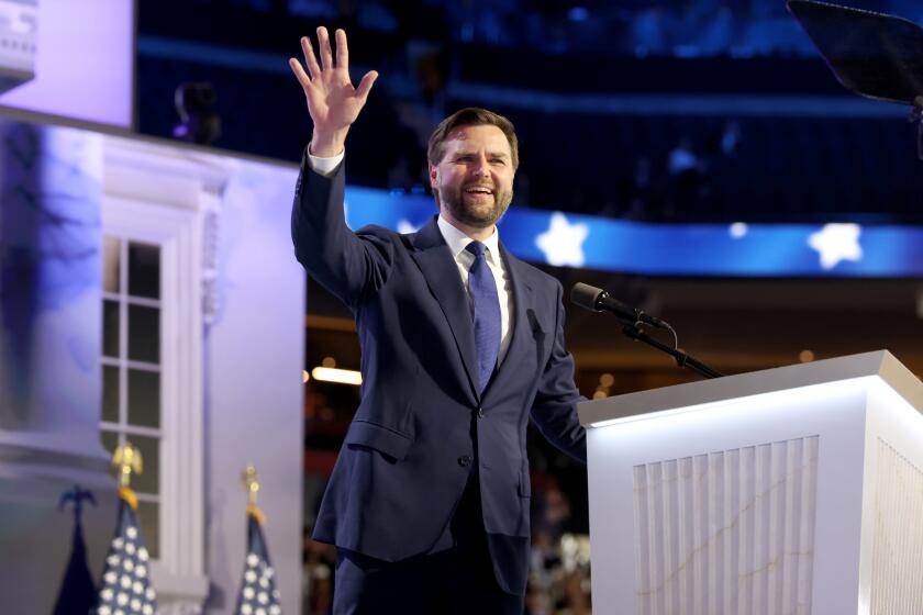 MILWAUKEE, WI JULY 17, 2024 -- Republican vice presidential candidate Sen. J.D. Vance waves during the Republican National Convention on Wednesday, July 17, 2024. (Jason Almond / Los Angeles Times)