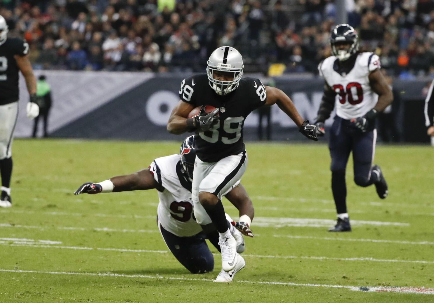 Oakland Raiders' Amari Cooper runs after a catch against the