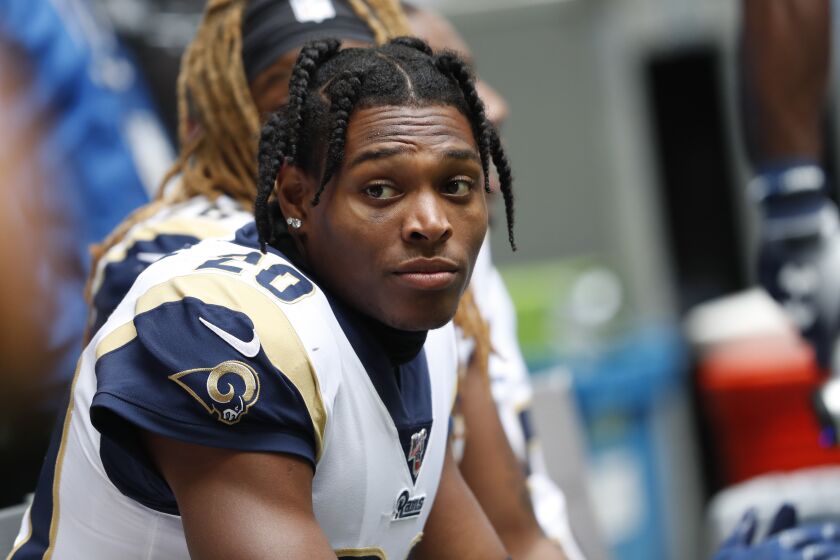 Los Angeles Rams cornerback Jalen Ramsey (20) sits on the bench against the Los Angeles Rams during the second half of an NFL football game, Sunday, Oct. 20, 2019, in Atlanta. (AP Photo/John Bazemore)