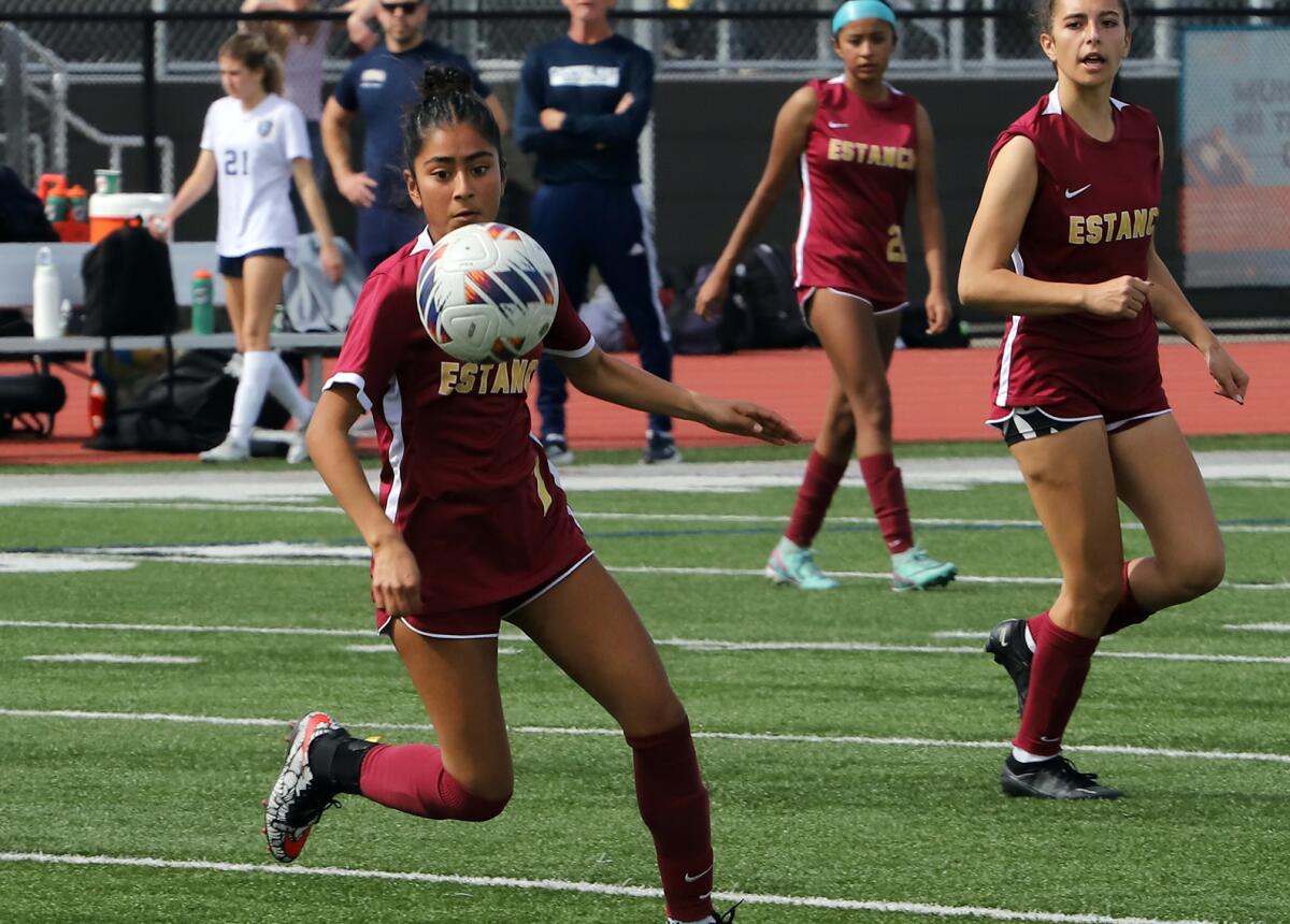 Senior captain Ana Pacheco (7) gets control of the ball for the Eagles against Campbell Hall during Saturday's match.