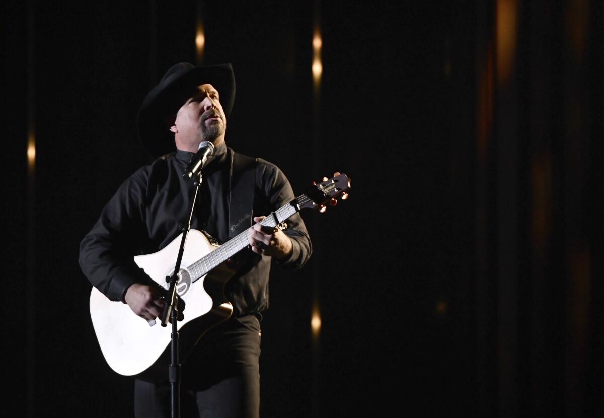 Garth Brooks performs during Wednesday's CMA Awards in Nashville.