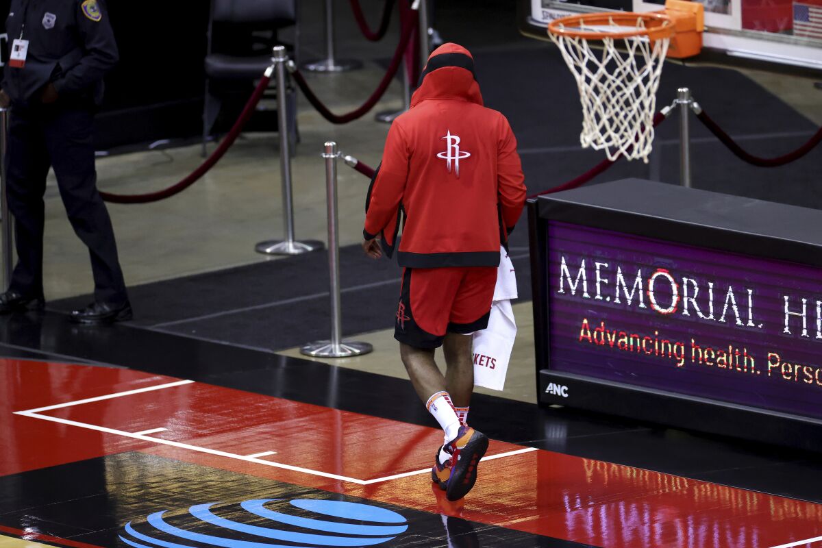 Houston Rockets' James Harden leaves the court following a loss to the Los Angeles Lakers in an NBA basketball game Sunday, Jan. 10, 2021, in Houston. (Carmen Mandato/Pool Photo via AP)