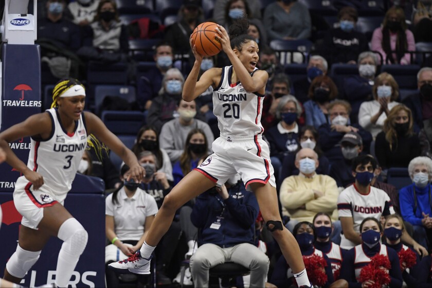 Connecticut's Olivia Nelson-Ododa pulls down a rebound during the first half of the team's NCAA college basketball game against Seton Hall, Friday, Jan. 21, 2022, in Storrs, Conn. (AP Photo/Jessica Hill)