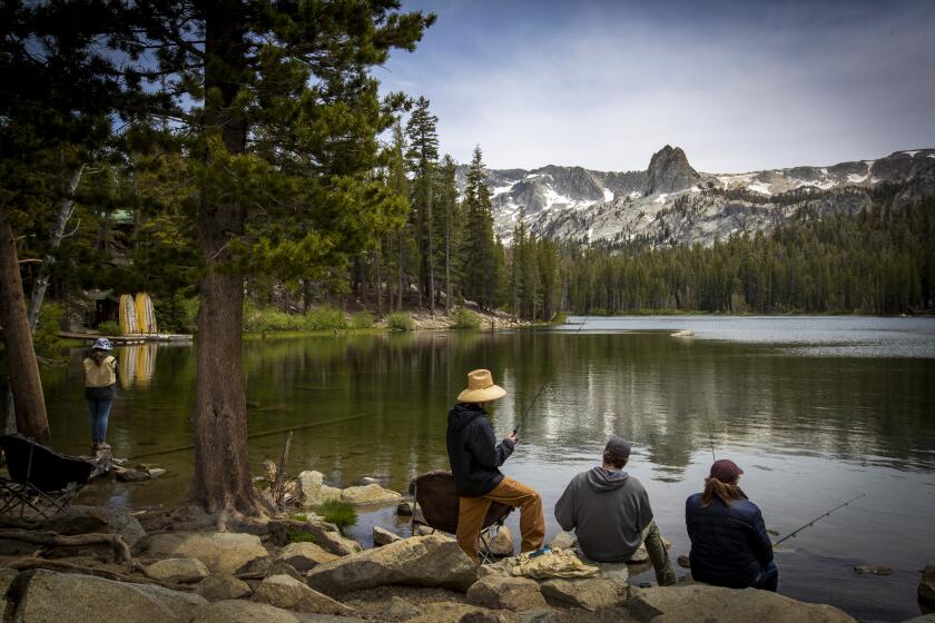 Mammoth Lakes, CA - June 22: Visitors fish at Lake Mamie in Mammoth Lakes Wednesday, June 22, 2022. .(Allen J. Schaben / Los Angeles Times)