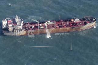 This picture taken from video shows the fuel tanker MV Stena Immaculate in the northern sea, off the coast of northeast England, Tuesday, March 11, 2025. (Sky via AP)
