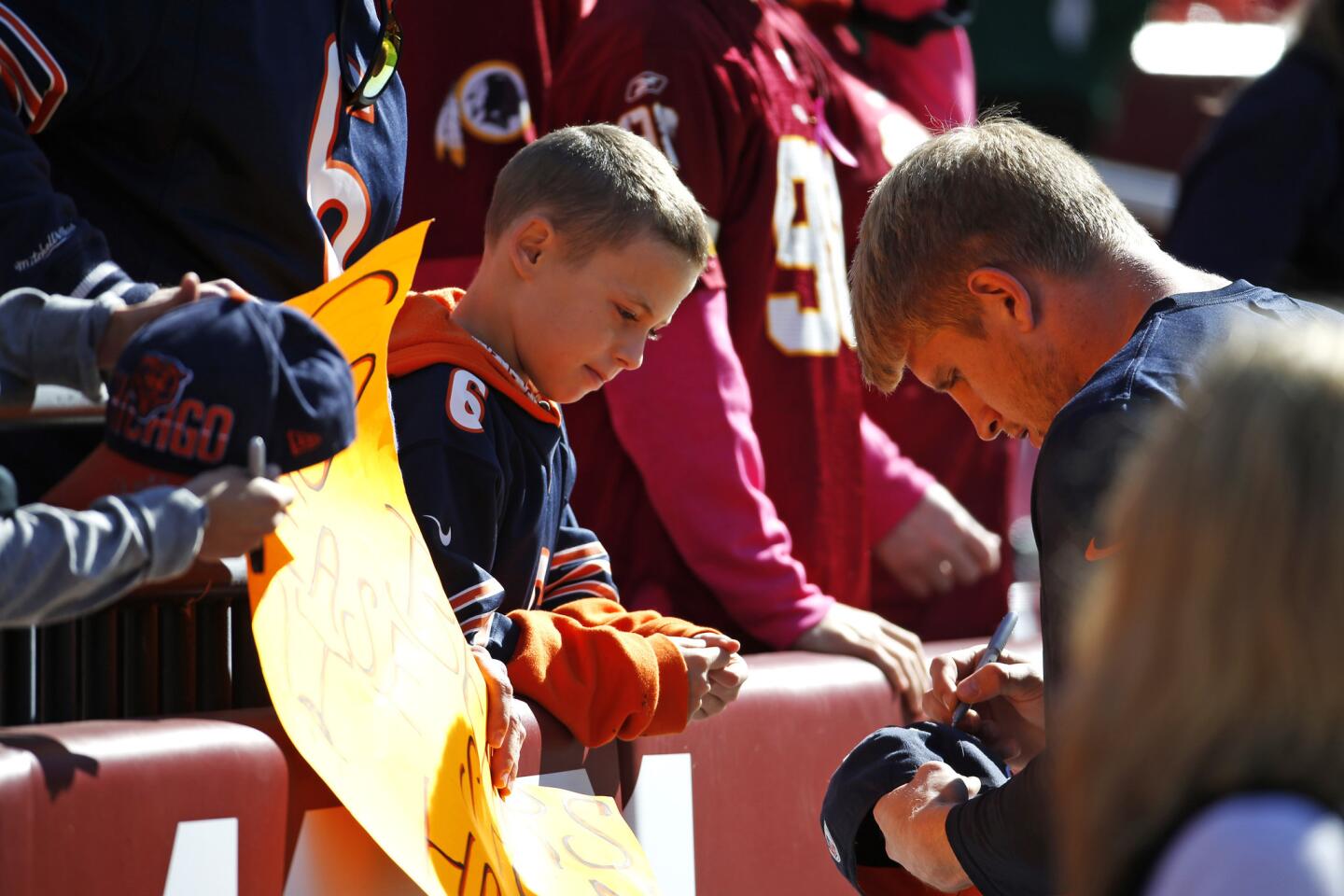 Chicago Bears defensive end Shea McClellin signs autographs prior to a game against the Washington Redskins at FedEx Field on Oct 20.