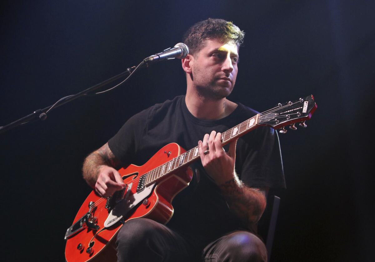Joe Trohman with Fall Out Boy performs