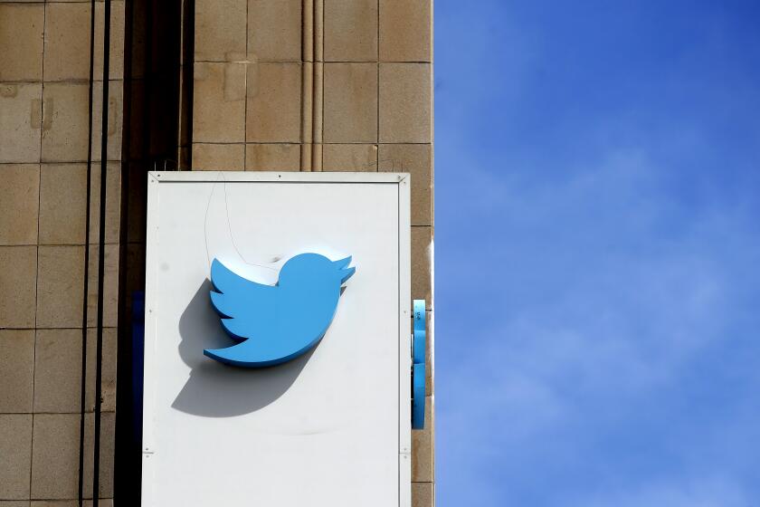 FILE - This July 9, 2019, file photo shows a sign outside of the Twitter office building in San Francisco. Twitter reports financial earnings on Friday, July 26. (AP Photo/Jeff Chiu, File)