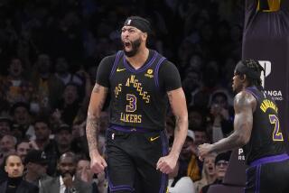 Los Angeles Lakers forward Anthony Davis celebrates after scoring during.