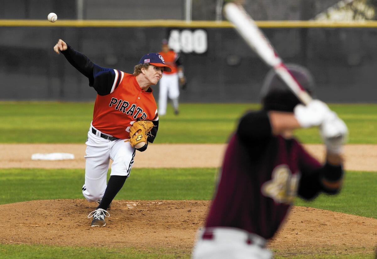 Former Orange Coast College pitcher Scott Serigstad, left, a junior at Cal State Fullerton, was taken in the 15th round by the Milwaukee Brewers in the MLB Draft on Saturday.