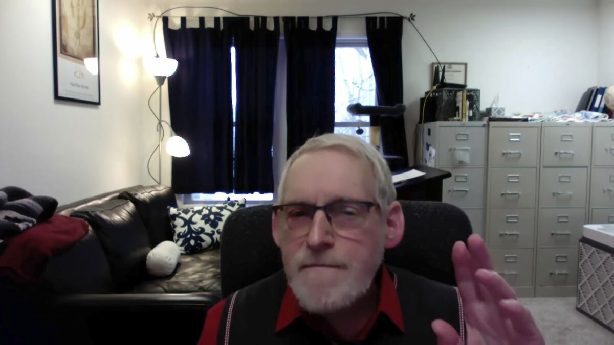 This image from video provided and taken by Barry Mehler shows Mehler during a 14-minute YouTube video at the start of a new term at Ferris State University. Mehler, a professor who was suspended after making a provocative video for his students, is threatening to file a lawsuit if Ferris State University, located in Michigan, doesn't lift the sanction. (Barry Mehler via AP)