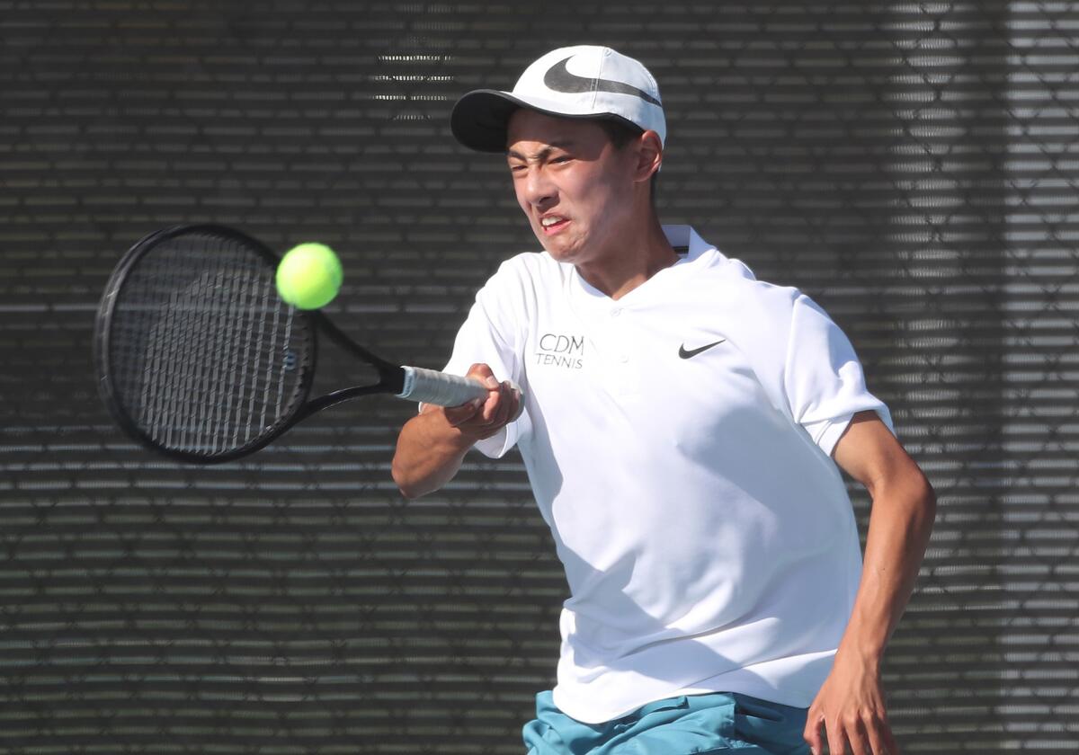 Corona del Mar's Ansel Lee runs down a forehand during the quarterfinals against Palos Verdes on Friday.