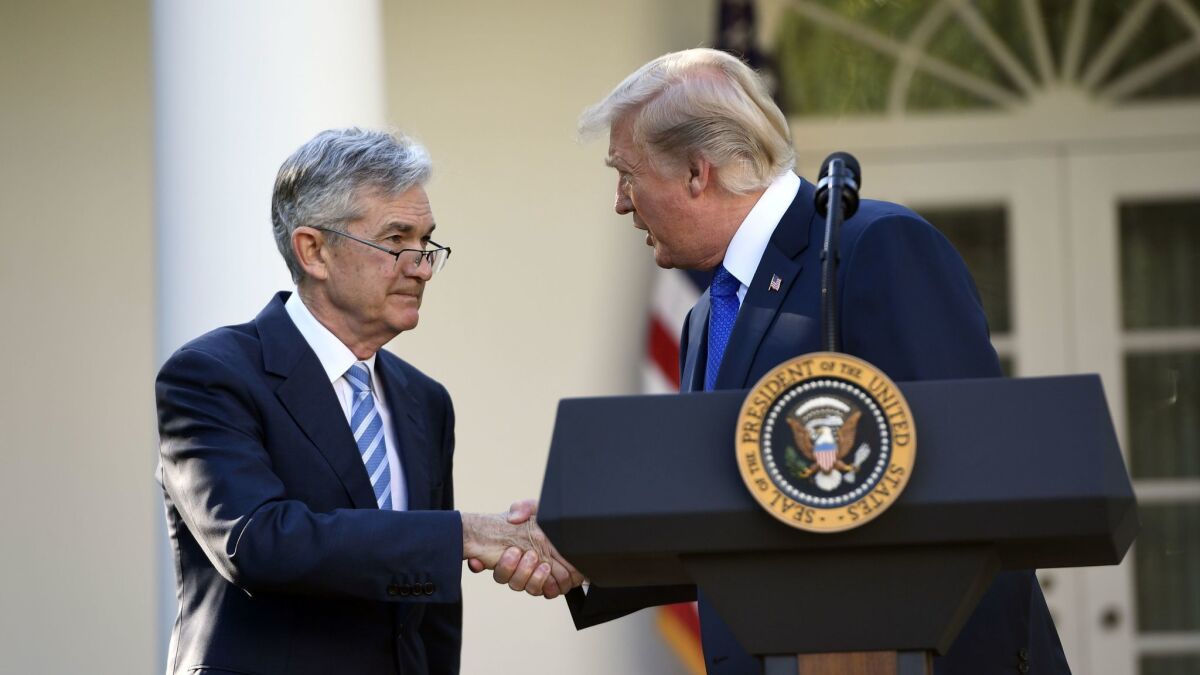 President Trump shakes hands as he announces the nomination of Jerome H. Powell to be chairman of the Federal Reserve.