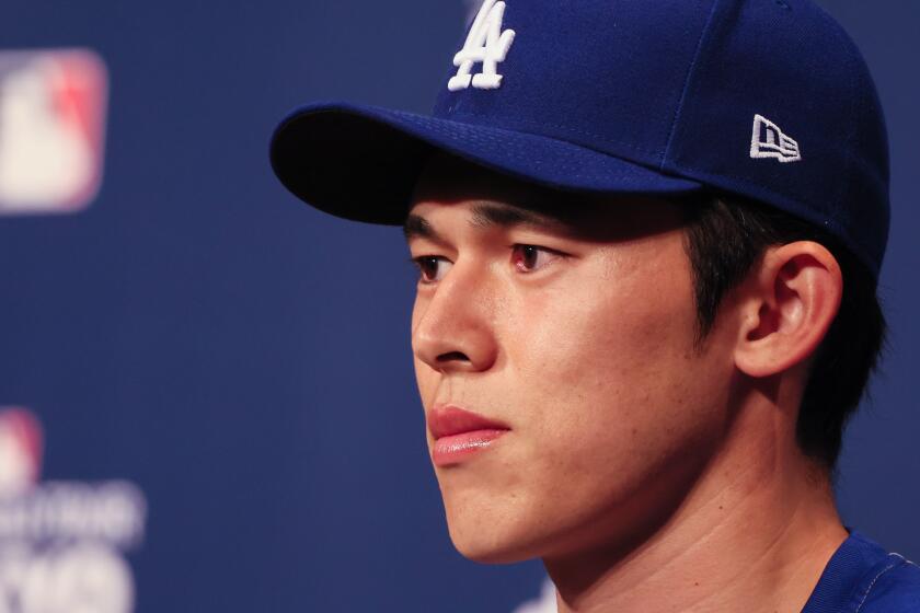 Tokyo, Japan, Friday, March 14, 2025 - Roki Sasaki attends a press conferences ahead of this weeks MLB Tokyo Series 2025 against the Chicago Cubs at the Tokyo Dome. (Robert Gauthier/Los Angeles Times)