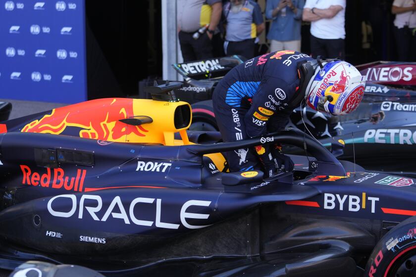 Red Bull driver Max Verstappen of the Netherlands exits his car after the qualifying session ahead of the Formula One Monaco Grand Prix at the Monaco racetrack, in Monaco, Saturday, May 25, 2024. (AP Photo/Luca Bruno)