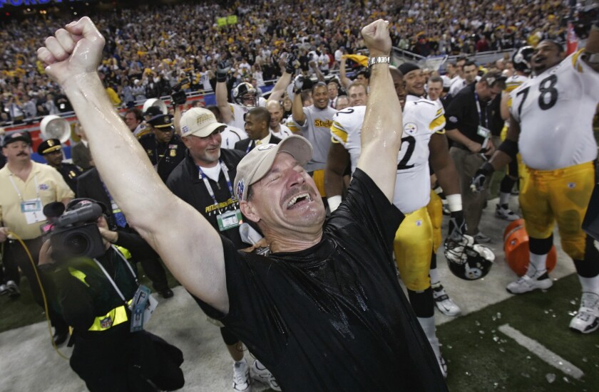 FILE - Pittsburgh Steelers head coach Bill Cowher reacts after being doused with water after the team's 21-10 win over the Seattle Seahawks in the Super Bowl XL football game in Detroit, in this Sunday, Feb. 5, 2006, file photo. Cowher, who won 149 games and a Super Bowl in 15 seasons with the Pittsburgh Steelers from 1992-2006, will be inducted into the Pro Football Hall of Fame next month. (AP Photo/Gene J. Puskar, File)